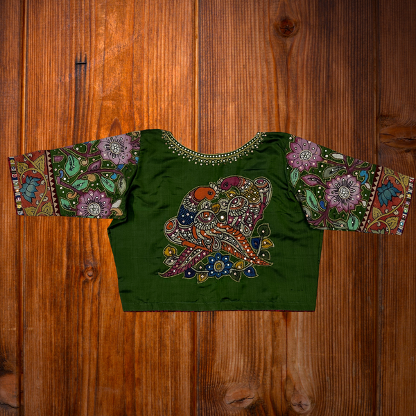 Elegant green Kanjeevaram silk Mayura blouse featuring Pen Kalamkari appliqué work on sleeves - Size 40